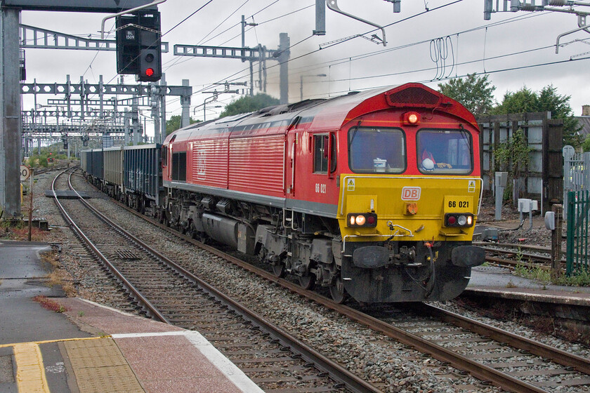 66021, 14.25 Acton TC-Tytherington (4C90, 23L), Bristol Parkway station 
 Due to its routing via Bath and thus unaffected by the closure of the GWML from Wootton Bassett to Westerleigh due to signalling issues, the 4C90 14.25 Acton to Tytherington empty wagons service passes through Bristol Parkway led by 66021. 
 Keywords: 66021 14.25 Acton TC-Tytherington 4C90 Bristol Parkway DB Schenker