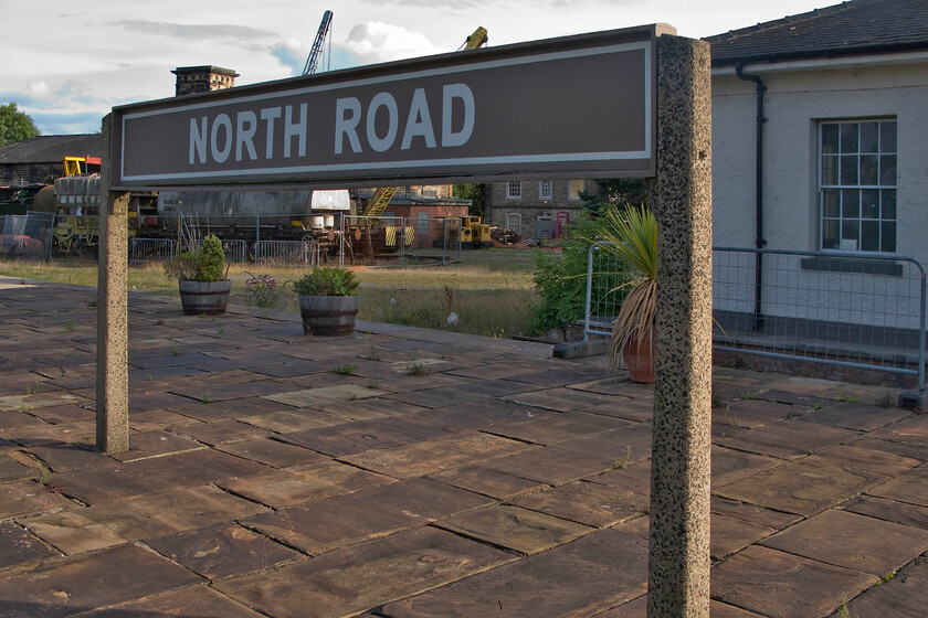 Reproduction running in sign, Darlington North Road Museum station 
 Darlington North Road station was the site of the original station to serve the town opening in 1842. It is closely linked to the historically important and famous Stockton and Darlington Railway. This photograph is taken through the railings of a sign that is actually on the platforms owned and operated by the Head of Steam Museum. 
 Keywords: running in sign Darlington North Road Museum station