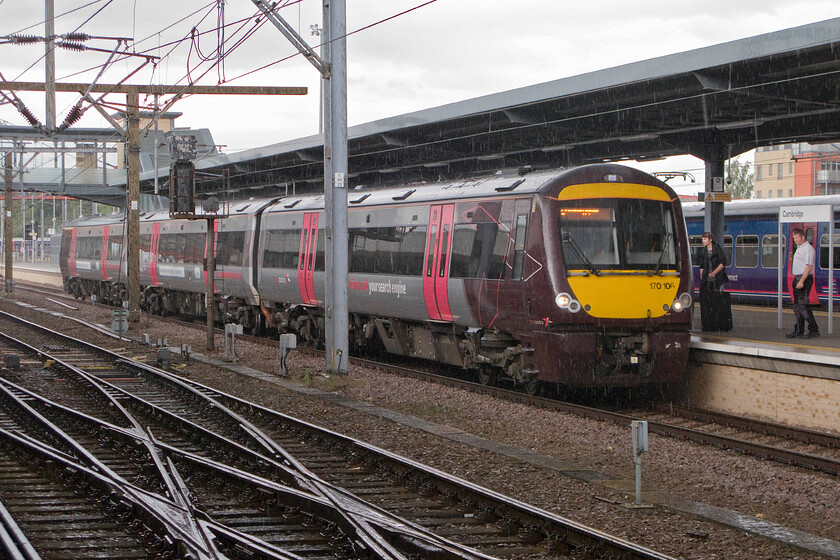 170106, XC 13.22 Birmingham New Street-Stansted Airport (1L42), Cambridge station 
 In torrential rain 170106 comes to a halt at Cambridge station working the 13.22 Birmingham New Street to Stansted Airport 1L42 service. 
 Keywords: 170106 13.22 Birmingham New Street-Stansted Airport 1L42 Cambridge station