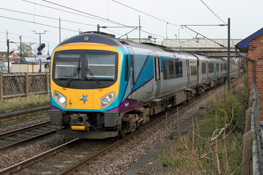 185150, TP 15.25 Liverpool Lime Street-Newcastle (9E15, 3E), Thirsk station 
 185150 races north through Thirsk station on the down fast line forming the 15.25 Liverpool Lime Street to Newcastle. Thirsk station was a pretty desolate place with very basic facilities. 
 Keywords: 185150 15.25 Liverpool Lime Street-Newcastle 9E15 Thirsk station