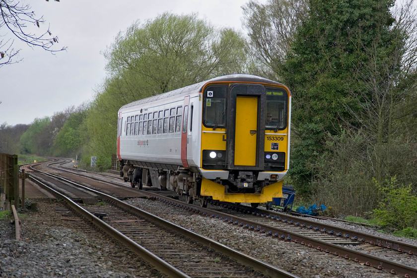 153309, LE 11.36 Norwich-Great Yarmouth (2C16), Girling's Level Crossing TG264083 
 156309 working the 11.36 Norwich to Great Yarmouth service crosses the River Yare over bridge number 359 as it approaches Girling's level crossing just east of Norwich. The crossing has user-operated gates but is fairly busy as it leads to a large boatyard and a number of waterside properties. 
 Keywords: 153309 11.36 Norwich-Great Yarmouth 2C16 Girling's Level Crossing TG264083 Greater Anglia