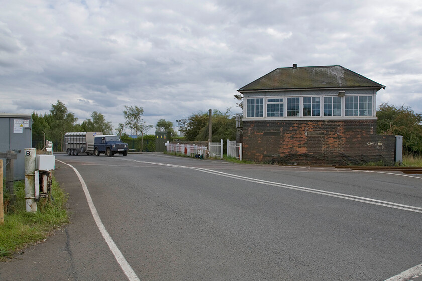 Urlay Nook signal box (NE, 1896 E) & boom gates 
 The driver of the Landrover probably does not realise that hes crossing a historically significant level crossing one of just two remaining boom crossings in operation on the national network! Urlay Nook crossing is controlled by the doomed 1896 (est.) signal box that should have been closed and demolished by now and the boom gates replaced by automatic barriers. However, due to sighting and safety issues caused by the angle of the approaching roads to the crossing this has been delayed and a re-think is now being undertaken. 
 Keywords: Urlay Nook signal box North Eastern Railway