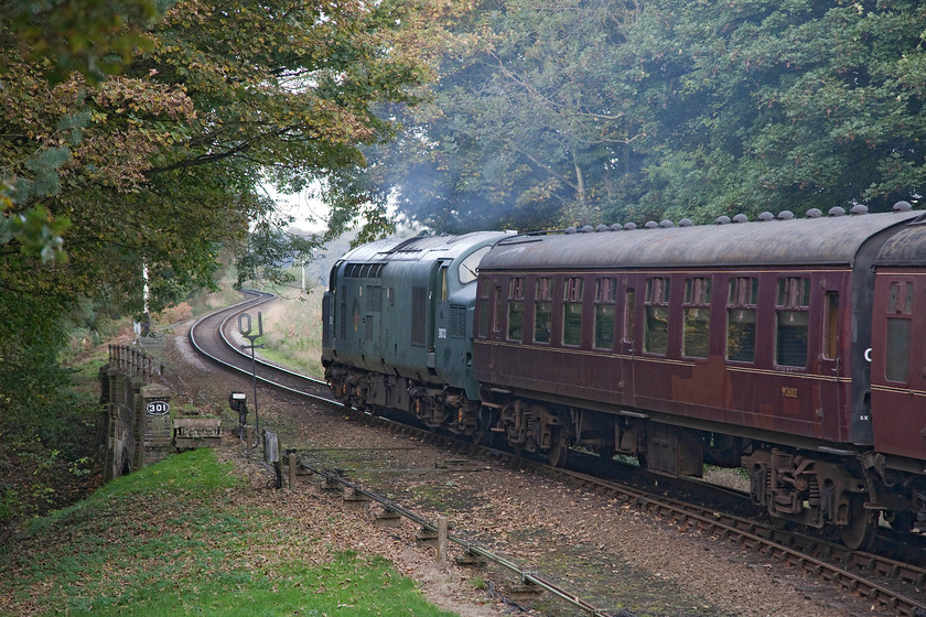 D6732, 09.45 Sheringham-Holt, Weybourne 
 I don't usually do going-away shots but the setting and lighting at Weybourne is just about perfect! D6732 (37032) pulls away from Weybourne station with the 09.45 Sheringham to Holt. 
 Keywords: D6732 09.45 Sheringham-Holt Weybourne