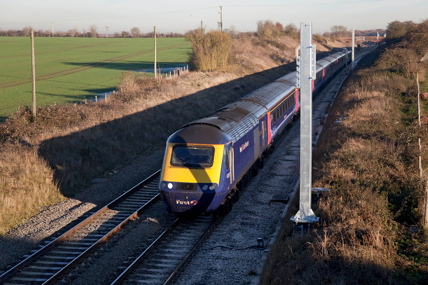 43037 & 43029, GW 13.36 London Paddington-Cheltenham (1G38), Bourton SU228874 
 A picture that clearly illustrates the perils of photographing on electrified lines and this is with only a few masts erected! 43037 'Penydarren' leads the 13.36 Paddington to Cheltenham Spa with 43029 working at the rear. This once super photographic spot near the village of Bourton will never be the same again after being mast free for 175 years! 
 Keywords: 43037 43029 13.36 London Paddington-Cheltenham 1G38 Bourton SU228874