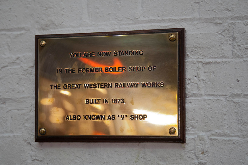 Commemorative plaque, Swindon Outlet Village 
 A plaque located on the wall of one of the retail outlets inside the Swindon Village. The V or the boiler shop was one of the largest in the works complex. 
 Keywords: Commemorative plaque, Swindon Outlet Village