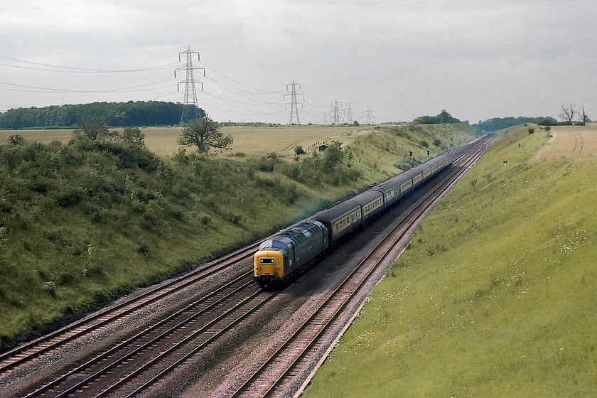 55009, 14.13 York-London Kings Cross (1A22), Westby SK962271 
 55009 'Alycidon' is picking up speed having now entered the quadruple section of the ECML from Stoke Junction as far as Peterborough. It is heading the 14.13 1A22 York to King's Cross. This is very remote spot down a long un-made track near the village of Westby. Today, apart from being spoilt by the electrification paraphernalia, the embankments are a lot more overgrown thus the wide open view is somewhat compromised, see.... https://www.ontheupfast.com/v/photos/21936chg/26500886004/x82201-91112-09-45-leeds-london-king 
 Keywords: 55009 14.13 York-London King's Cross 1A22 Westby SK962271