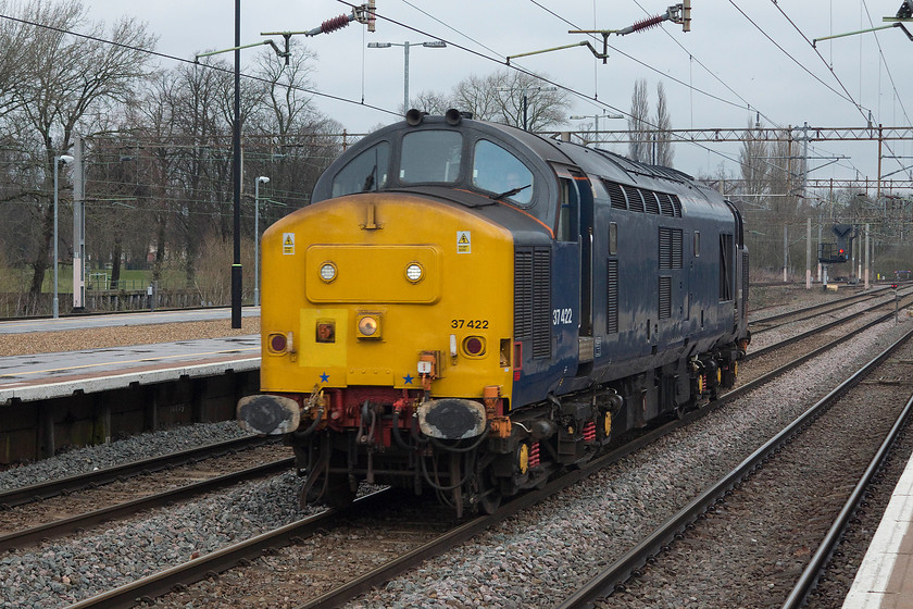 37422, 06.50 Crewe Gresty Bridge-Wembley LE (0A68), Northampton station 
 Whilst our train waited in Northampton station the signallers allowed 37422, doing the 06.50 Gresty Bridge to Wembley light engine move, to pass and continue its up journey. Just out of sight to the right was a fair collection of spotters who had the 'gen' and had come to photograph its passage. It's pretty impressive to still be able to photograph a 53 year old locomotive on the network and goes to show what a great design these Type 3s were when ordered as part of the Modernisation Plan. 
 Keywords: 37422 06.50 Crewe Gresty Bridge-Wembley LE 0A68 Northampton station