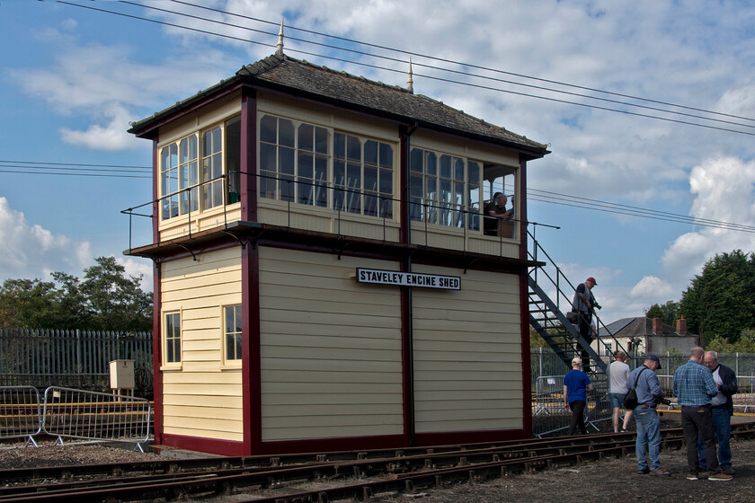 Staveley Engine Shed signal box (former Pinxton, MR, 1897) 
 A smartly reconstructed Midland signal box, named Stavely Engine Shed Junction looks absolutely in place located on the numerous lines that lead from Barrow Hill engine shed towards the headshunt and then the exchange line in and out of the complex. However, looks can be deceiving for three reasons. Number one, the box is not actually connected to any signalling or point work being a shell with a frame, some rusty levers and a tatty unkempt interior. Number two, it is not an original location with the box put here for what appears to be show purposes. Number three, the box was originally located at Pinxton located between Alfreton and Kirkby in Ashfield a few miles south of its new location. The box dates from 1897 and shows many classic Midland Railway characteristics. 
 Keywords: Staveley Engine Shed signal box former Pinxton MR 1897 Midland railway