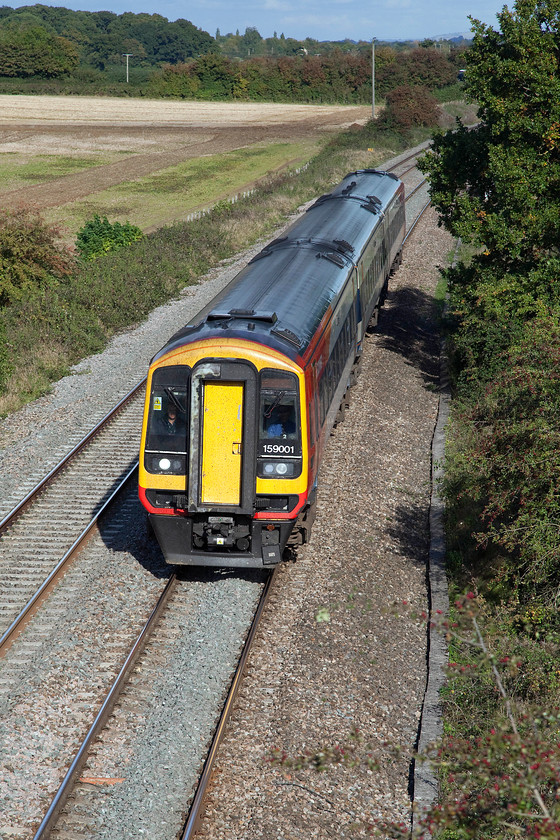 159001, SW London Waterloo-Yeovil Pen Mill (1V35), Berkley ST802494 
 159001 approaches Frome passing Berkeley with the 1V35 London Waterloo to Yeovil Pen Mill. This service takes the usual route south west from London as far as Salisbury. It then heads north to Westbury where it reverses to then head west again down to Yeovil leaving the mainline at Castle Cary. 
 Keywords: 159001 London Waterloo-Yeovil Pen Mill 1V35 Berkley ST802494