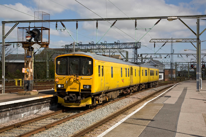 950001, testing all tracks, Clacton-on-Sea station 
 Having worked out of another platform a little earlier, the Network Rail track recording unit 950001 returns still undertaking tests and recording the condition of the track on its cameras. It is about to pass one of Clacton's famous 'searchlight' signals C55 
 Keywords: 950001 testing all tracks Clacton-on-Sea station Class 150 Track recording train