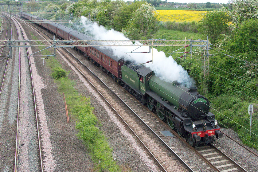 61036, final leg of The Highlands and Islands, 10.37 Carnforth-London Euston (1Z64), Victoria bridge 
 Steam on the busy southern end of the WCML is getting increasingly rare now, and to have it a peak-time on a weekday unheard of! The epic nine-day Highlands and Islands railtour traveled virtually the entire network in Scotland behind a whole variety of steam. It started out from King's Cross on 09.05.19 and here it is on its final leg heading south to Euston eight days later. Former LNER Thompson B1 61036 'Mayflower' is leading the train past Victoria Bridge between Northampton and Milton Keynes running bang on time in amongst all the Friday evening commuter trains. 
 Keywords: 61036 The Highlands and Islands, 10.37 Carnforth-London Euston 1Z64 Victoria bridge