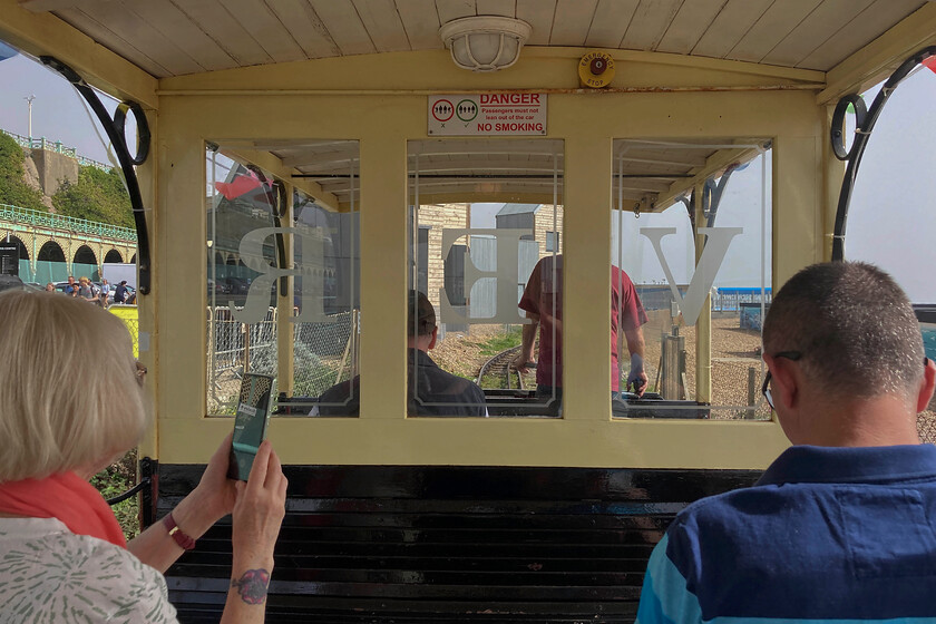 Aboard No. 9, Aquarium-Black Rock working , approaching volleyball 
 Taken from inside VER's Car 9 as it is about halfway through its journey from Aquarium (near Brighton Pier) to Black Rock. There is a small depot and maintenance facility called, appropriately, Halfway as it is equidistance between the two stations and it is close to where this photograph was taken. The Volk's Electric Railway remains the world's oldest operational electric railway opening in 1883. It utilises a third centrally positioned electrified rail and runs on a two feet and eight-half inches (825 mm) gauge. Apart from wartime closure, it has been in operation pretty much ever since it opened carrying hundreds of thousands of visitors. 
 Keywords: Aboard No. 9 Aquarium-Black Rock working approaching volleyball