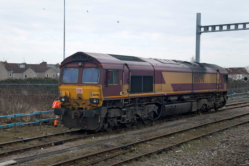 66096, stabled, Swindon Cockleburry Sidings 
 As our train approached Swindon from the east we passed 66096 sitting in Cockleburry Sidings. As we were on a HST a half decent picture could be taken through the drop light window. Notice the electrification stanchion yet to be wired. 
 Keywords: 66096 Swindon Cockleburry Sidings