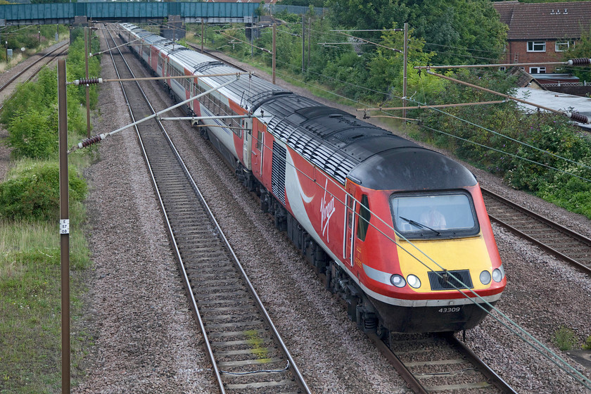 43309, 05.40 Sunderland-London Kings Cross (1Y08, 19L), Arlesey footbridge 
 As 43109 this HST power car was part of set 254027 delivered new to the Eastern Region in 1979. Here, 38 years later, as 43309, it's still going strong and in front-line service powering the 05.40 Sunderland to King's Cross past Arlesey in Bedfordshire. 
 Keywords: 43309 1Y08 Arlesey footbridge