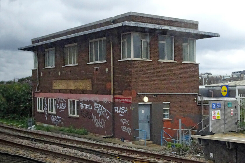 Clapham Junction B signal box, closed (BR, 1952) 
 Clapham Junction B signal box is an interesting survivor having been closed by BR in 1980 when control of all signalling in this part of London passed over to the Victoria signalling centre. It thus had a relatively short operating life span of just twenty-eight years. In common with much of the Southern Region in this area, it contained a then state-of-the-art Westinghouse Brake & Signal Co. Ltd. style 'L' power lever frame. Whilst the box still stands, I am unsure of its present-day use. 
 Keywords: Clapham Junction B signal box closed