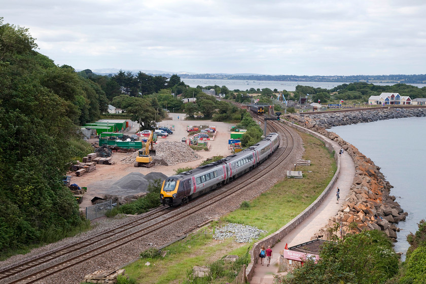 220030, XC 16.25 Plymouth-Leeds (1E67, 2E), Langstone Rock 
 Taken from the top of Langstone Rock at Dawlish Warren, 220030 heads away with the 16.25 Plymouth to Leeds. In the foreground is the Red Rock Cafe, a favourite for many who spend time photographing in this area, unfortunately, it was closed during our brief visit! 
 Keywords: 220030 1E67 Langstone Rock