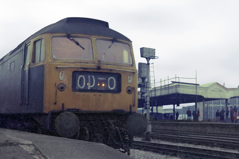 Class 47, unidentified down working, Bristol Temple Meads station 
 With the abandonment of four character headcodes from the 1st January, it was policy for trains to display 0000 in their headcode box. However, this class 47 has a bit of a mess on display and must be crying out to have its domino display panel installed! The 47 waits at the head of an unidentified working about to leave for the south west at Bristol Temple Meads station. 
 Keywords: Class 47 Bristol Temple Meads station