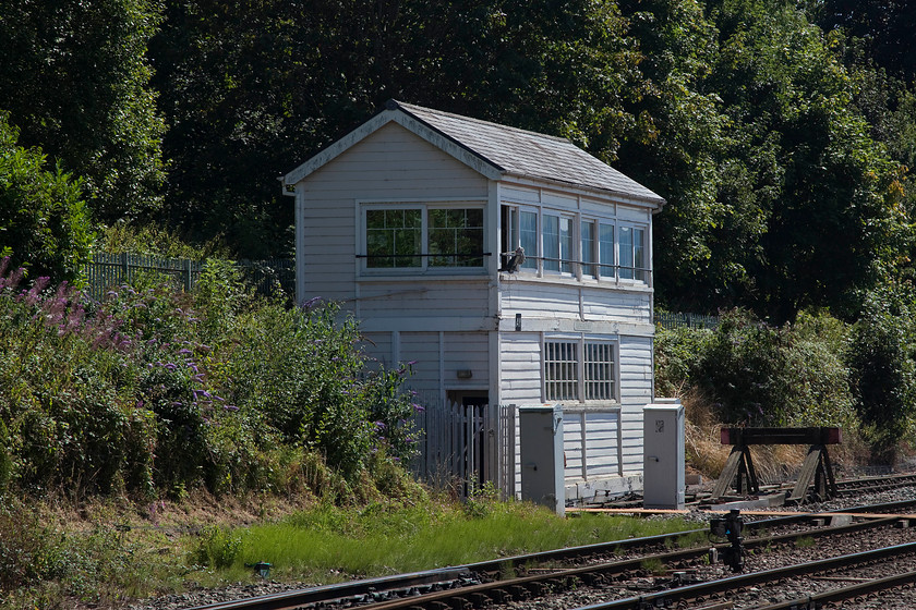 Abergavenny signal box (GWR, 1934) 
 Abergavenny signal box is a Type 28b 1934 structure. Whilst it has had work done, including new windows, it has been kept looking pretty good. The only things really spoiling it is the lack of a chimney stack. Most have been removed from boxes due to the conversion away from a coal stove to keep it warm. Notice the mop hanging out of the window indicating that the vinyl floor (probably!) has had a good clean! 
 Keywords: Abergavenny signal box