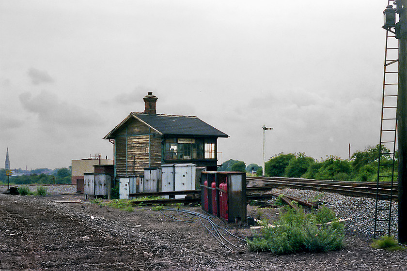 Newark Crossing signal box (GN, 1869) 
 By 1978, mechanical signalling had been banished from the entire length of the ECML. However, there was still one box that operated semaphores signals (but not for the ECML itself) at the flat crossing just north of Newark. Here, looking south west, the ECML crosses the Nottingham to Lincoln line from left to right with Newark Crossing box controlling movements. The box was a tiny Great Northern structure dating from 1869. In this picture, the southern link from the Lincoln line to the ECML has recently been removed having been reinstated taking a slightly different route to the one seen here some years later. The box continued to operate and control the crossing until it was removed in 1981. 
 Keywords: Newark Crossing signal box