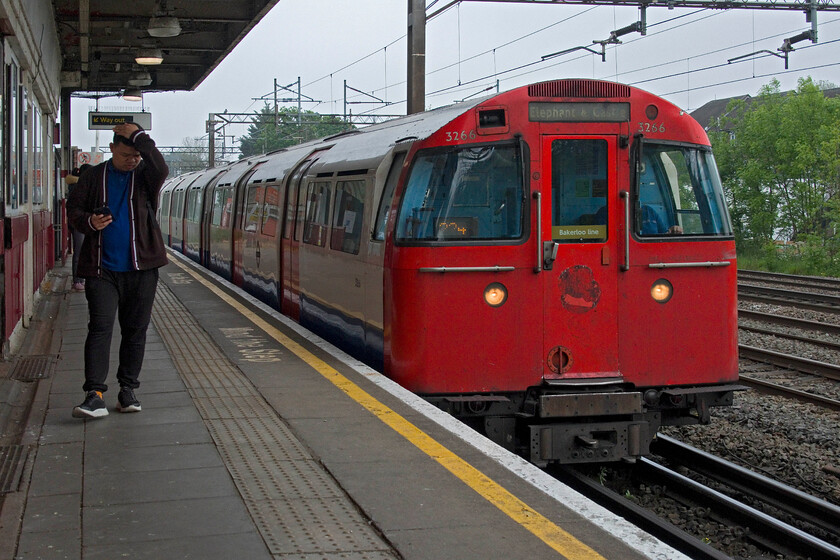 3266, Harrow & Wealdstone-Elephant & Castle working, South Kenton TfL station 
 1972 stock number 3266 leads a Harrow and Wealdstone to Elephant and Castle TfL service into South Kenton station. I took this train back into London as far as Baker Street where I changed for a Hammersmith and City Line train. The 1972 is currently the oldest non-heritage trains running in the United Kingdom but, despite this, there are no plans for their replacement yet until at least the 2030s by which time they will be sixty to seventy years old! 
 Keywords: 3266 Harrow & Wealdstone-Elephant & Castle working South Kenton-Baker Street South Kenton TfL station