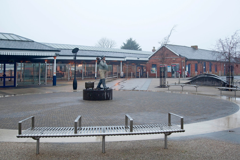 Frontage, Skegness station 
 The frontage of Skegness station underwent a major refurbishment during 2011. In the centre of this image there is a replica statue of the Skegness' famous Jolly Fisherman. This character first appeared in 1908 being a creation of artist John Hassall for the Great Northern Railway's promotional department. He appeared with the now famous slogan, 'Skegness is SO bracing'. The figure has been adopted as the mascot of the East Coast town. 
 Keywords: Frontage, Skegness station