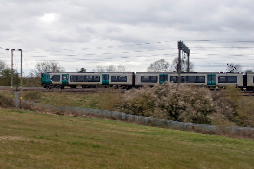 350234, LN 15.25 Northampton-London Euston (2Z44, 3E), between Roade & Ashton 
 Passing the fields between the villages of Roade and Ashton in Northamptonshire, 350234 works the 15.25 Northampton to Euston 2Z44 service. Close examination of the image reveals that the destination screen on the side of the carriages state Northampton rather than Euston. However, with the travel restrictions in place due to the Covid-19 crisis, I suspect that there are not many passengers to be confused by the error. 
 Keywords: 350234 15.25 Northampton-London Euston 2Z44 between Roade & Ashton London Midland Desiro