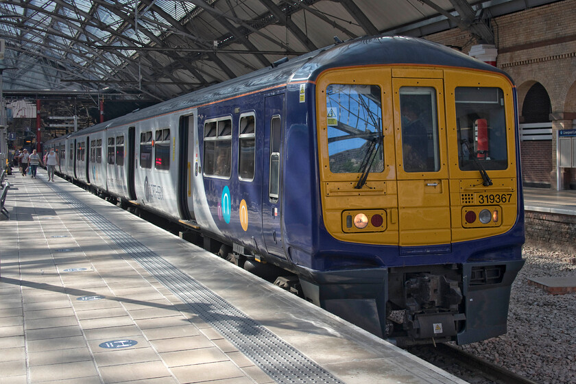 319367, NT 17.17 Liverpool Lime Street-Manchester Victoria (2V83, 3E), Liverpool Lime Street station 
 Northern's 319367 stands at Liverpool Lime Street's platform one. I travelled on this, the 17.17 to Manchester Victoria, to just one stop to Edge Hill station, a distance of just less than one and a half miles! 
 Keywords: 319367 17.17 Liverpool Lime Street-Manchester Victoria 2V83 Liverpool Lime Street station Northern