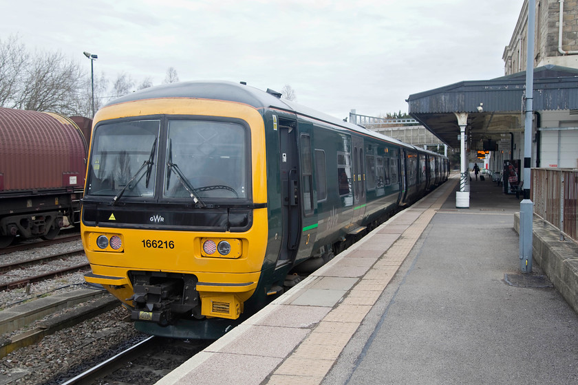 166216, GW 10.47 Swindon-Westbury (2M07, 2E), Swindon station 
 Networker Turbo 166216 stands at Swindon waiting to leave with the 2M07 to Westbury via Melksham. These units were cascaded from the Thames Valley routes with the introduction of the class 387s. In turn, some of the displaced class 150s have moved further west and some to the north....it's all change in 2018! 
 Keywords: 166216 2M07 Swindon station