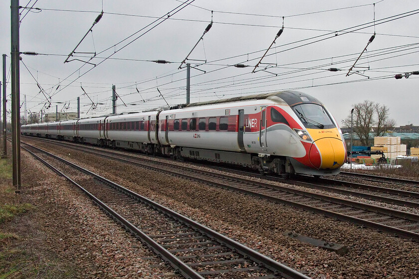 801201, GR 07.30 London King's Cross-Edinburgh Waverley (1S06, RT), Sandy TL176510 
 One of the handful of LNER services to run on this strike-riven day passes Sandy with the Middlefield Industrial Estate as a backdrop. 801201 works the 1S06 07.30 Kings Cross to Edinburgh that arrived bang on time like all other trains observed on this day due to the lack of other traffic holding things up no doubt! 
 Keywords: 801201 07.30 London King's Cross-Edinburgh Waverley 1S06 Sandy TL176510 LNER Azuma