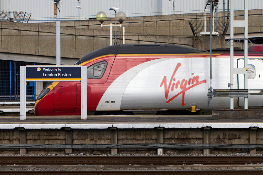 390118, VT 13.20 London Euston-Birmingham New Street (9G18), London Euston station 
 No guesses as to where this image was taken! 390118 sits at Euston ready to leave with the 13.20 9G18 service to Birmingham New Street. It's interesting to think that when (if?) HS2 opens that these fast services will become secondary ones, that is if the Pendolinos are still operating on this route off course! 
 Keywords: 390118 13.20 London Euston-Birmingham New Street 9G18 London Euston station