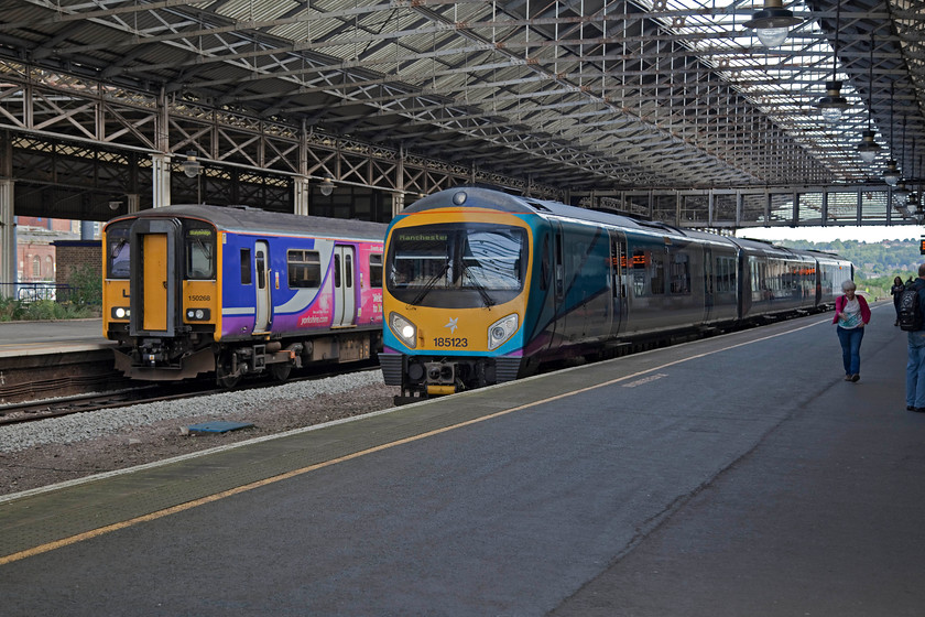 150268, NT 10.15 Huddersfiled-Stalybridge (2T81, 1L) & 185123, TP 08.37 Hull-Manchester Piccadilly (1K07, 2L), Huddersfield station 
 As I had missed my initial train to Halifax, I spent a little time at Huddersfield station. It was a large, airy and pleasant station with good facilities. The platforms are wide meaning that it never felt crowded even though it appeared to handling a good number of passengers. Here, 150268 waits to work the local 10.15 to Stalybridge whilst 185123 arrives with the 08.37 Hull to Manchester Piccadilly. 
 Keywords: 150268 2T81 185123 1K07 Huddersfield station