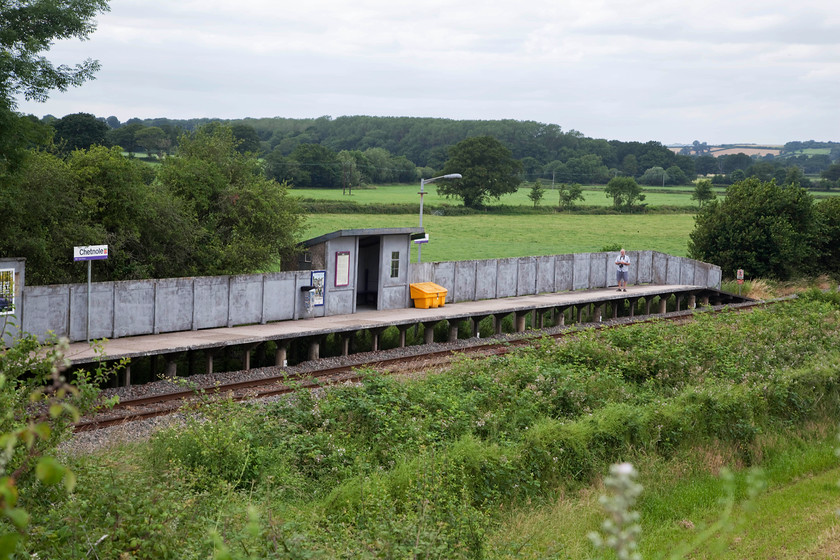 Andy, Chetnole station 
 Andy stands on the delightfully remote station at Chetnole in Dorset. This is on the line that runs south from Castle Cary to Dorchester. It appears that the entire station was manufactured in pre-fabricated concrete units and then assembled on site, this replaced the original timber structure opened in 1933 by the GWR. It is likely that the Southern's concrete plant at Exmouth Junction was responsible for its manufacture. 
 Keywords: Chetnole station