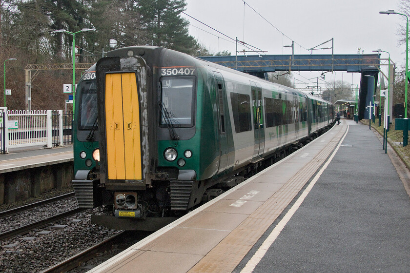 350407, LN 08.30 Milton Keynes Central-London Euston, (2K08, 13L), Apsley station 
 With chaos ensuing in the railway in the Rugby area caused by 'trespassing on the line' all southbound trains were either cancelled or running very late. This meant that I was forced to take the next available train from Milton Keynes to Apsley as and when it departed. This meant that I could not wait for the first off-peak train so I was forced to pay the full price, it doesn't seem fair does it really? Having travelled from Milton Keynes on the delayed 08.30 to Euston 350407 leaves Apsley station. At least I was able to travel in the relative luxury of one of TPE's former units that seem to be quieter and roomier than the 350/1/2/ and 3 London Midland subsets. 
 Keywords: 350407 08.30 Milton Keynes Central-London Euston, 2K08 Apsley station London Northwestern Desiro