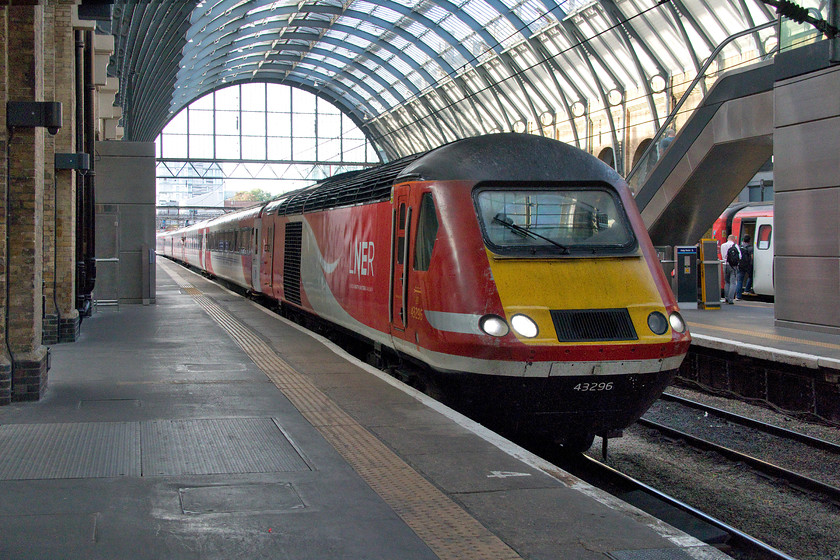 43296, GR 16.03 York-London King`s Cross (1Y88, 36L), London King`s Cross station 
 43296 arrives at the front of the 16.03 HST service from York at King's Cross. This train only arrived thirty-six minutes late, on a normal day this would be highly unsatisfactory but on the day leading up to the UK's hottest recorded temperature, this was a relatively small amount of time with some services over two hours adrift! 
 Keywords: 43296 16.03 York-London King`s Cross 1Y88 London King`s Cross station