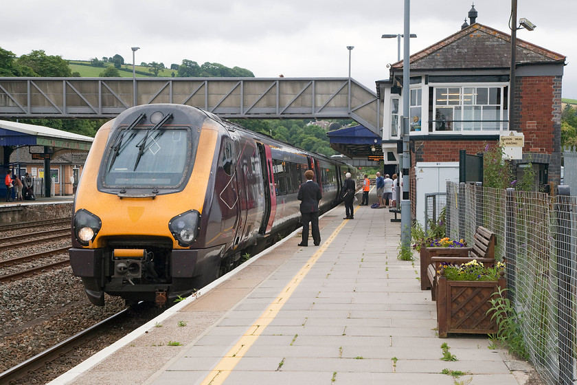 220024, XC 09.35 Penzance-Manchester Piccadilly (1M49, 1E), Totnes station 
 Voyager 220024 pauses at Totnes station working the 09.35 Penzance to Manchester Piccadilly a journey of nearly four hundred miles. Notice the well-restored ex Totnes signal box on the platform that has been turned into a smashing caf. 
 Keywords: 220024 1M49 Totnes station