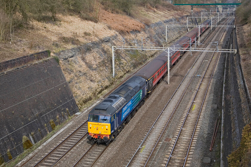 47828, 08.46 Crewe-Wembley footex (1Z81), Roade cutting 
 Carrying Railwaymen supporters for their big day out at Wembley, DRS' 47828 leads the 08.46 Crewe to Wembley Central footex charter running as 1Z81 through Roade cutting. Playing in the Football League Trophy Final (also known as the Johnstone's Paint Trophy) they were to beat Southend 2-0. 
 Keywords: 47828 08.46 Crewe-Wembley footex 1Z81 Roade cutting DRS