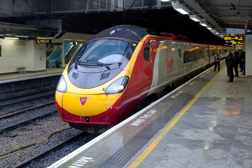 390123, VT 06.43 London Euston-Edinburgh (9S44), Birmingham New Street station 
 390123 is being readied for departure from Birmingham New Street as the 9S24 06.43 Euston to Edinburgh. An unusual train as it takes the West Midlands route rather than the more common Trent valley line. 
 Keywords: 390123 06.43 London Euston-Edinburgh 9S44 Birmingham New Street station