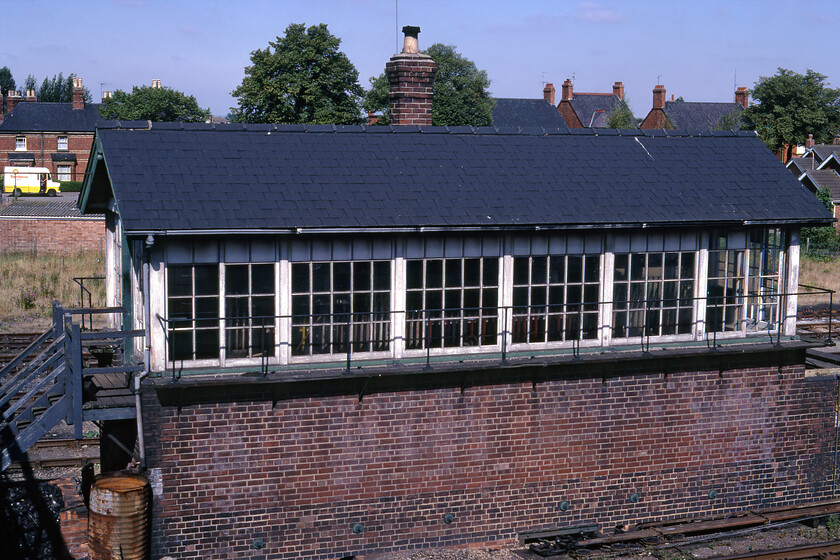 Spalding No. 2 signal box (GN, 1920) 
 I took a very similar photograph to this one just a year previously, see.. https://www.ontheupfast.com/p/21936chg/29682543604/spalding-no-2-signal-bo so I am not too sure why I did so again. Some forty years later the only thing that I can think of is that my 1980 image was taken on a very dull and overcast day whereas this one is in some lovely summer sunshine. Spaldings Number 2 box was opened by the Great Northern in 1920 closing in July 1984 with control moving to Number 1 box at the other end of the station. Notice the Sunblest Transit delivery van parked in the background on Park Road, twelve months previously, Graham's orange Mini was parked in the same spot! 
 Keywords: Spalding No. 2 signal box GN Great Northern