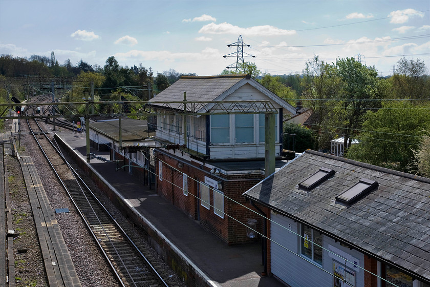 Thorpe-le-Soken signal box (GE, 1822), closed, used as NR office 
 Thorpe-le-Soken signal box sits in a lofty position on the station's platform. The station is located just east of the junction where the branch heads off east to Walton-on-the Naze from the double-track route to Clacton. The feather for the Walton line can be seen above the colour light to the far left of the photograph. 
 Keywords: Thorpe-le-Soken signal box 1822 closed NR Office Great Eastern Railway