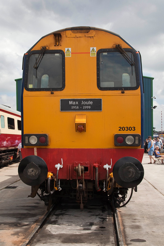 20303, on-display, DRS Gresty Bridge 
 The blunt end of 20303 'Max Joule 1958-1999' on-display at Gresty Bridge open day. This is the more common and preferred driving end of the class 20s as driving in the other direction does not give such good visibility. The nameplate is carried in the more unusual position of the cab end. It is named after the former DRS manager. 
 Keywords: 20303 DRS Gresty Bridge