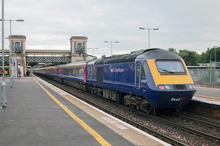 43087, GW 17.33 London Paddington-Paignton (1C91, 3E), Exeter St. David's station 
 43087 '11 Explosive Ordnance Disposal Regiment Royal Logistics Corps' brings up the rear of the 17.33 Paddington to Paignton at Exeter St. David's. The stations iconic lift towers dominate the view at this end of the station and make the scene instantly recognisable. 
 Keywords: 43087 1C91 Exeter St. Davids station