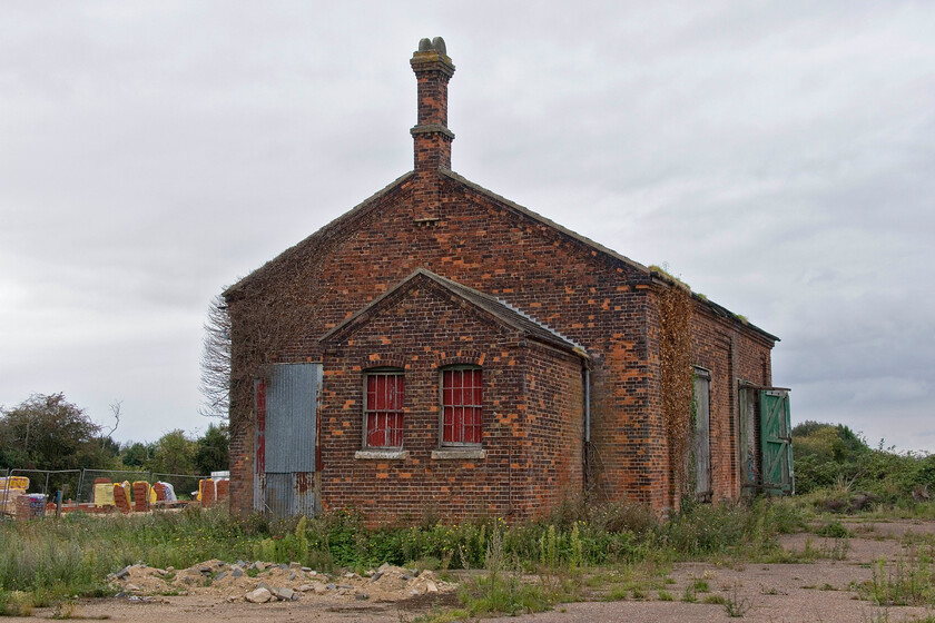 Former goods shed, Cowbit 
 The rather grand former Cowbit goods shed still stands on what would have been former railway land. The twin track GN & GE Joint line ran to the left of the building in this photograph where the building work is taking place. I hope that the goods shed can be put to further use. It would make a really intesting house or local business conversion. 
 Keywords: Former goods shed Cowbit