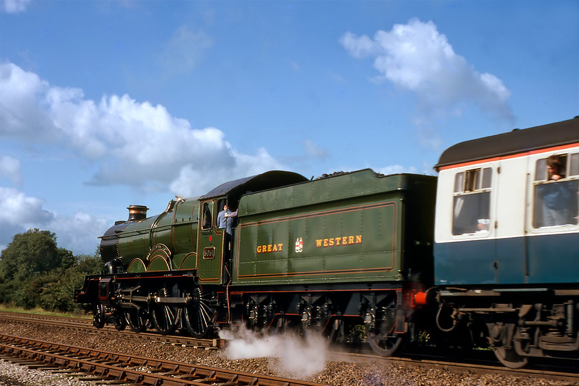 5051, outward leg of The John Mynors Memorial, London Paddington-Bridgnorth (SVR), Hatton Bank SP226663 (Courtesy of Graham) 
 This particular photograph is courtesy of Graham being initially consigned to his rejects box. This was probably as he, like I, was not a fan of going-away photographs but also as it exhibits some motion blur. 5051 wearing its Drysllwyn Castle nameplates that it only carried for one year when new in 1936 is seen storming up Hatton bank just approaching the station. It is leading the outward leg of the John Mynors Memorial Train that started out from Paddington and ended up at the end of the Severn Valley Railway at Bridgnorth with 5051 coming off at Dorridge for diesel haulage from there onwards. This photograph makes an interesting comparison to the next photograph taken by me! 
 Keywords: 5051 The John Mynors Memorial London Paddington-Bridgnorth SVR Hatton Bank SP226663