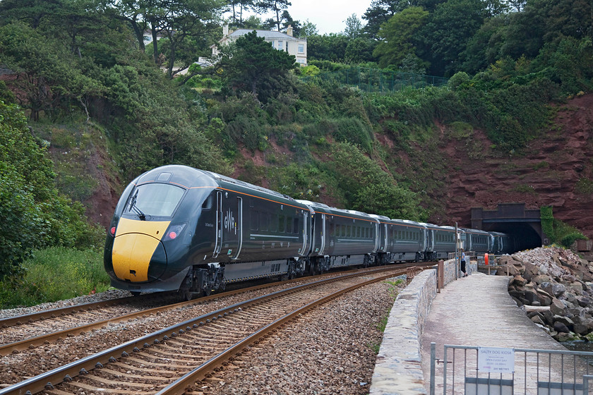 800004 & 800003, 12.47 Penzance-North Pole IEP Depot test run (5X92), Parson's Tunnel 
 800004 'Isambard Kingdom Brunel/Sir Daniel Gooch' and 800003 'Queen Elizabeth II/Queen Victoria' work the 12.47 Penzance to North Pole test run into Parsons Tunnel. Given that this was such a historic event, the first run of one of the IETs in and out of Devon and Cornwall, Andy and I were surprised that there were no other photographers at this spot on the sea wall to capture the scene. 
 Keywords: 800004 800003 12.47 Penzance-North Pole IEP Depot test run 5X92 Parsons Tunnel