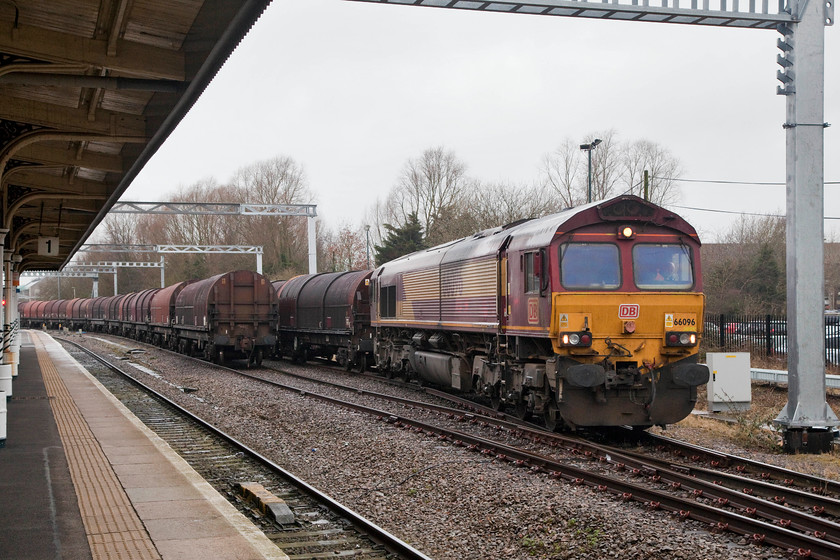 66096, shunting steel wagons, Swindon station 
 66096 shunting some covered steel wagons at Swindon. It spent some time marshalling these wagons before it headed off in an easterly direction. 66096 was a Toton based locomotive that was constructed in 1999 by Electro-Motive Diesel in Ontario Canada. 
 Keywords: 66096 Swindon station