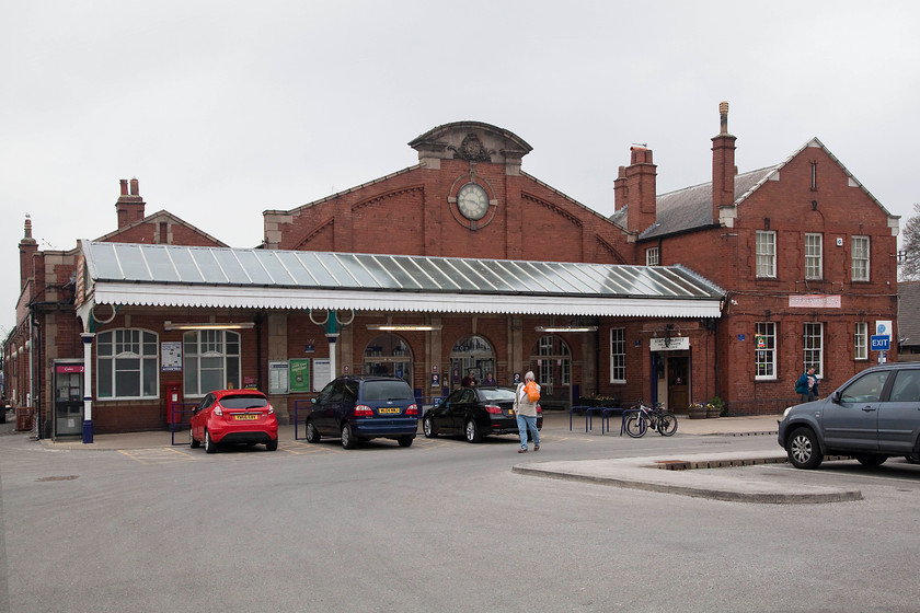 Frontage, Bridlington station 
 The impressive frontage of Bridlington station. The station first opened in October 1846 by the York and North Midland Railway and had a train shed designed by George Townsend Andrews very similar to those found at Filey and Beverley. However, due to the huge success and growth of Bridlington, largely in part due to the railway, the present station was built in 1912 by the North Eastern when six platforms were in use. The covered station concourse is the home to a number of small businesses as well as the ticket office and a caf/bar that is heavily railway-themed. 
 Keywords: Frontage Bridlington station