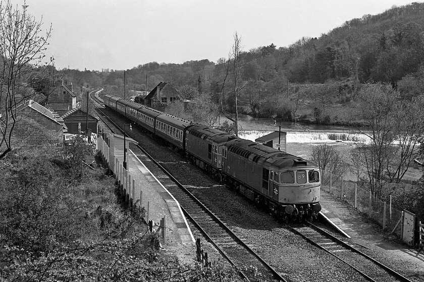 Class 33s, unidentified Portsmouth Harbour-Bristol Temple Meads working, Avoncliff station 
 A pair of Class 33 Cromptons pass through Avoncliff station working an unidentified service towards Bath and Bristol Temple Meads. With the Southern Region continuing the use of its double letter route identification system it was always more straightforward to identify their trains even when odd things such as double-heading created an element of confusion. With a route code of 89, it identifies this train as being a Portsmouth Harbour to Bristol Temple Meads service via Netley and Salisbury. 
 Keywords: Class 33s Portsmouth Harbour-Bristol Temple Meads working Avoncliff station Crompton