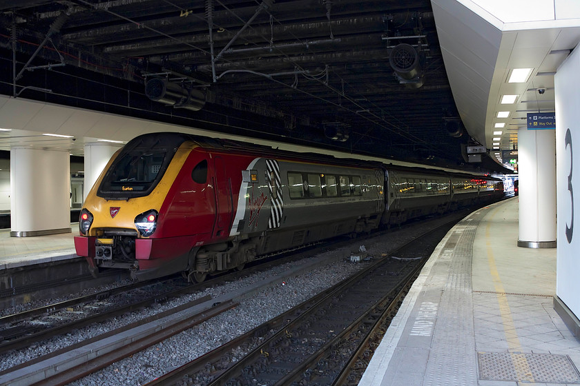 221101, VT ECS for 15.24 Shrewsbury-London Euston (1B34, 11L), Birmingham New Street station 
 221101 'Louis Blriot' waits in the gloom at New Street station. It is waiting to be joined by another class 221 presently on its way from Shrewsbury that will then form the ten-car unit to London Euston. 
 Keywords: 221101 1B34 Birmingham New Street station