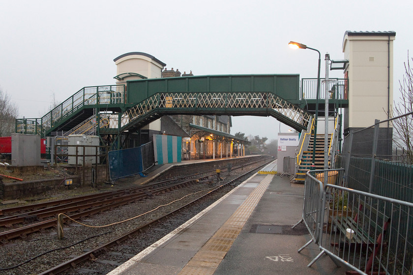 Machynlleth station 
 The scene at Machynlleth station showing the extensive works being undertaken by Network Rail and ATW to improve facilities. Not least of these is the installation of a huge new footbridge complete with lifts. The station has good facilities and passenger numbers are growing steadily. The railways in the area are of key importance to many people as the road infrastructure is not good as we found out on our long drive home! 
 Keywords: Machynlleth station