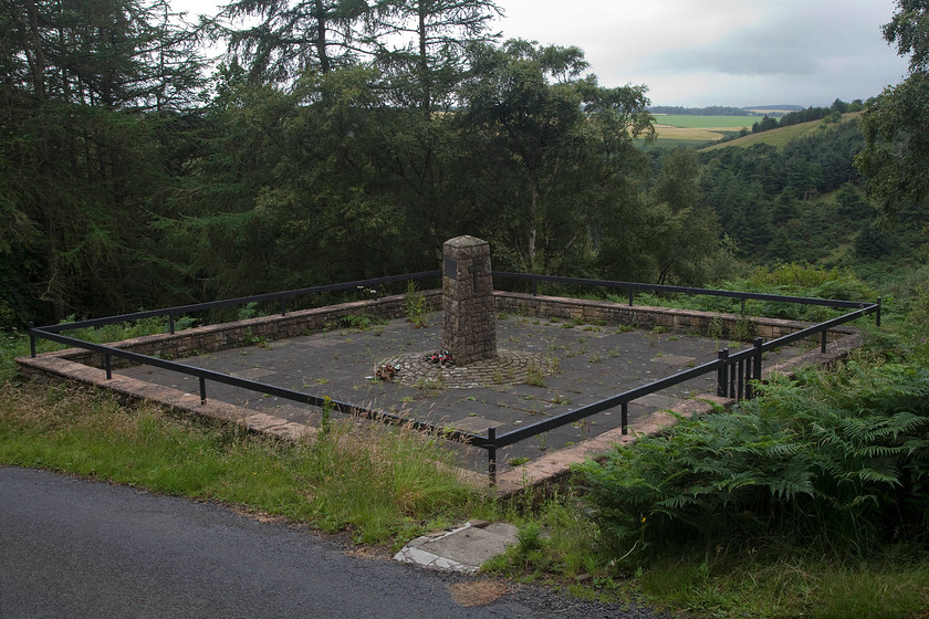 Penmansheil memorial NT796670 
 The Penmansheil memorial is located above the course of the old railway tunnel that collapsed on 10th March 1979 killing two contractors working on lowering the track. The memorial has recently been cleared and some flowers had recently been laid. 
 Keywords: Penmansheil memorial NT796670